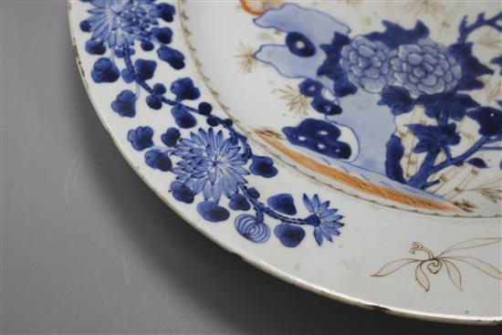 A Chinese grisaille and underglaze blue dish, c.1740, decorated with birds, bamboo, rocks and flowers, label verso from Viscount Bridpo